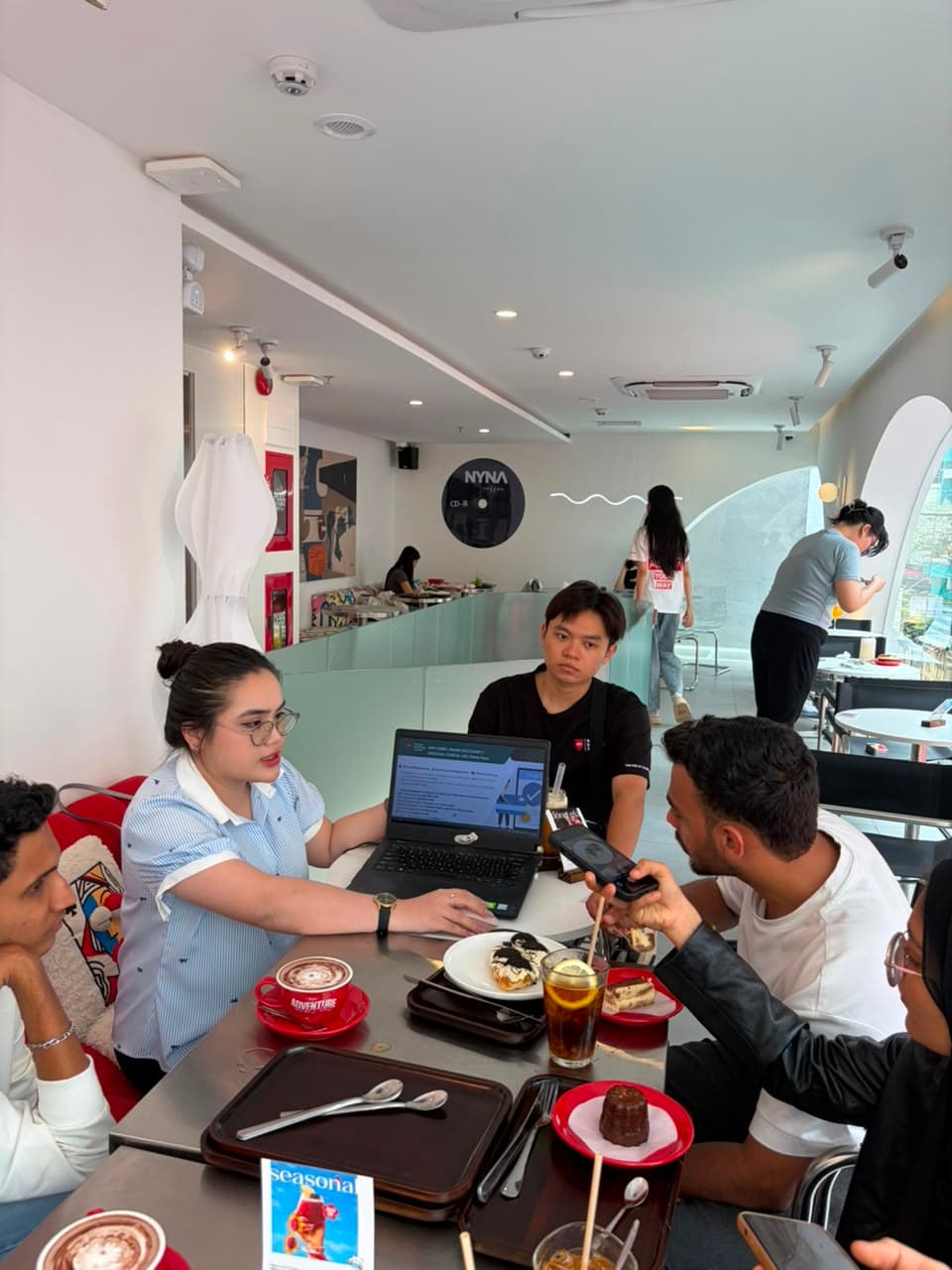 Hospitality students participating in a training discussion